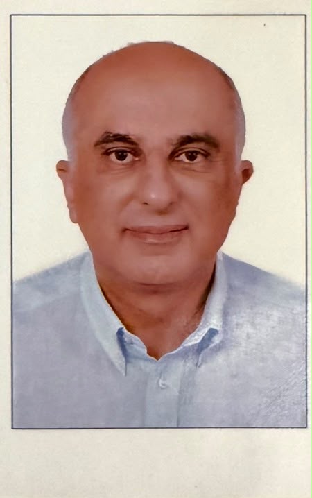 Portrait of Dr. Ahmed Yaqoot, Chairman of AFAQ